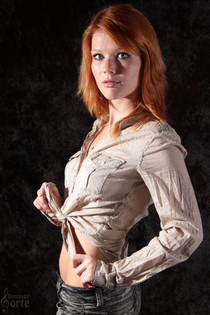 Alluring red haired seductress gets secu - Picture 2