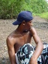 A lusty dark latino twink showing a very lean young body but very large