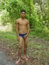 A dark randy latino twink proudly showing his huge equally dark dick and