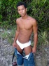 Lascivious latino twink is proud to show off his large uncut ultimate