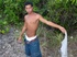 Lascivious latino twink is proud to show off his large uncut ultimate