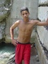 A robust young bronze latino sunbathing among the rocks and wanking that