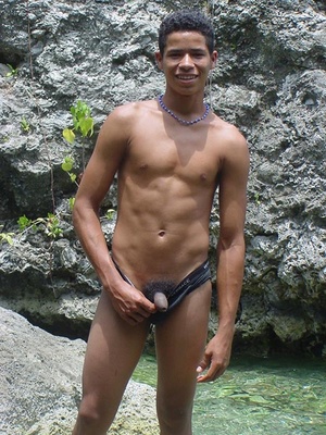 A robust young bronze latino sunbathing among the rocks and wanking that impossibly large dick of his until he cums - Picture 4