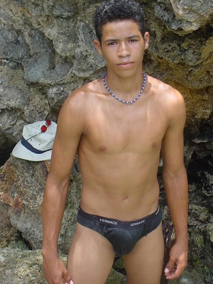 A robust young bronze latino sunbathing among the rocks and wanking that impossibly large dick of his until he cums - Picture 7