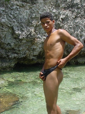 A robust young bronze latino sunbathing among the rocks and wanking that impossibly large dick of his until he cums - Picture 9