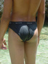A robust young bronze latino sunbathing among the rocks and wanking that