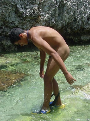 A robust young bronze latino sunbathing among the rocks and wanking that impossibly large dick of his until he cums - Picture 12