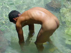 A robust young bronze latino sunbathing among the rocks and wanking that impossibly large dick of his until he cums - Picture 14