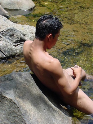 A lewd latino twink takes a dip in the shallow waters of the brook and there jerks himself off in the water until he cums - XXXonXXX - Pic 8