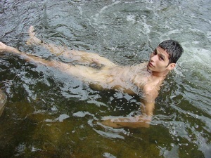A horny latino twink takes a swim in the shallow waters of the brook and there wanks off in the cool waters until he pops his nut - XXXonXXX - Pic 15