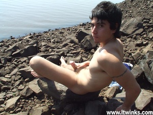 A fair skinned latino twink sunbathes on the rocks and poses his deliciously huge cock and plays with it - XXXonXXX - Pic 14