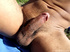 A bronzed lascivious latino plays naked on the bank of a brook showing