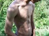 A dark randy latino twink proudly showing his huge equally dark dick among