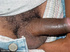 A randy and very dark young latino hunk displays his already heavily aroused