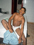 A lewd latino twink poses nude in different areas of a room displaying