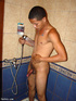 A dark lusty latino plays naked on the bed doing a demo on how to manipulate