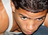 Already aroused dark skinned latino twink spreads his legs to show a nice