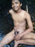 Uncut horny Asian gay gets nude to play in the stream with his cock to