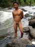 Nature lover guy gets nude by rocks and water and jerks of his cock to