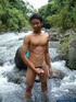 Nature lover guy gets nude by rocks and water and jerks of his cock to