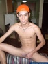 Slim nude Asian guy in face cap shows his butt, slim frame and jerk cock