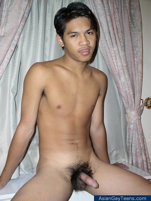 Young slim Asian model showing off his sexy slim figure and jerks cock to jizz - Picture 1