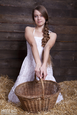 Very hot teen beauty with a plait undresses on the hayloft - Picture 3