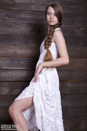 Very hot teen beauty with a plait undresses on the hayloft - Picture 4