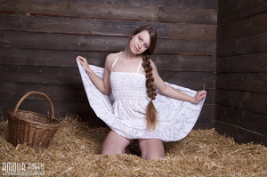 Very hot teen with a thick plait posing nude on the hayloft - Picture 2