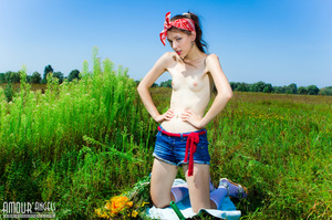 Naughty teen girl in red bandana takes off her jeans shorts to play with a carrot outdoors - XXXonXXX - Pic 5