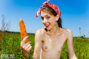 Naughty teen girl in red bandana takes off her jeans shorts to play with a carrot outdoors - XXXonXXX - Pic 20
