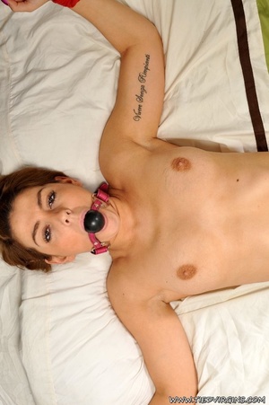 Brown haired bitch wriggles her sexy body on the bed against her binds and her gag - XXXonXXX - Pic 5