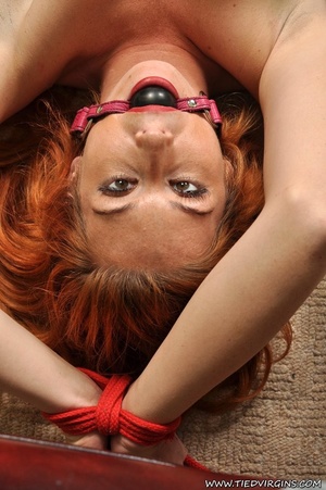 Fiery haired slutty bitch becons with her beautifully gagged mouth and gorgeously squirming body - Picture 6