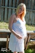 Alluring tegan in a white sundress and enjoying the outdoor fresh air