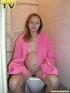 Luscious pregnant teen takes her seat in the toilet and lets out a steaming