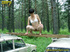 Half naked teen walks on a ladder proped on two cars squats and relieves
