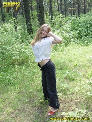 Horny daring blonde teen pulls down her pants in the forest then takes a piss right on the forest floor with tips of weeds tickling her ass and pussy - XXXonXXX - Pic 20