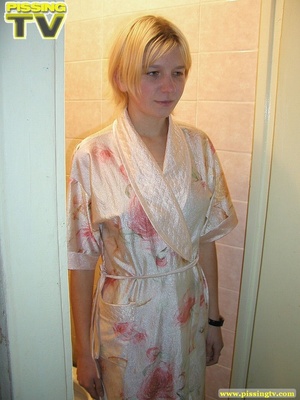 A slutty relaxed blonde bitch demonstrates how enjoyable  taking a piss in the toilet can be - XXXonXXX - Pic 1