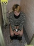 Blonde bitch sits on the toilet and enjoys some moments of wonderful piss