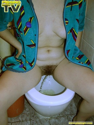 Lovely brunette teener takes a piss in the toilet with legs spread wide and her glorious gushing can be clearly seen - Picture 10