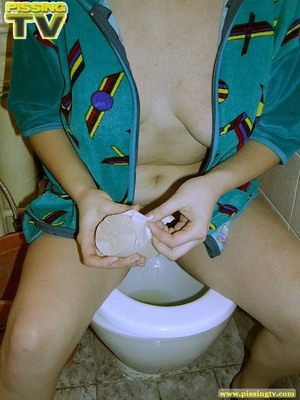 Lovely brunette teener takes a piss in the toilet with legs spread wide and her glorious gushing can be clearly seen - Picture 14
