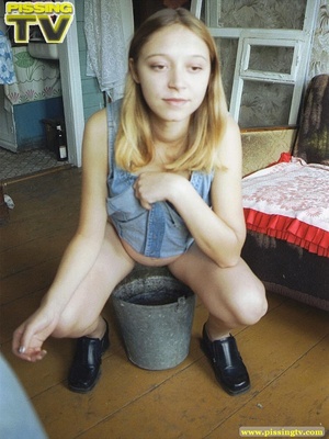 Playful blonde teen bitch enjoys being able to let loose her steaming golden piss in a bucket where her piss creates so much noise as it splashes around - XXXonXXX - Pic 11