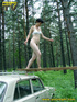 daring brunette teen balances