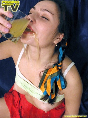 Busty brunette teen is really ecstatic in showing her juicy cunt release a warm stream of golden piss to a waiting glass which she then drinks - Picture 19