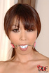 Lovely naked massuese gagged and is tied to her massage table on her side
