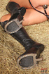 Lovely brunette wearing a horse headress with a bitgagand a butt plug,