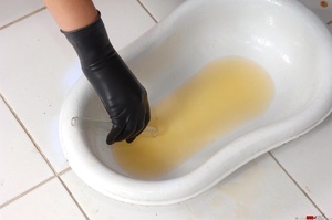 Lusty bitch in a tight leather dress makes naked blonde take a piss over a bed pan then takes sample of piss and tests it with litmus paper that changes color - XXXonXXX - Pic 9