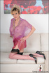 Hot blonde mama tempts to the extreme with her sheer pink blouse and see