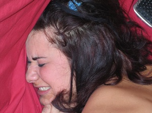 Tattooed teen brunette with a mouth bit cuffed to the bed wet of water expelled from her ass - XXXonXXX - Pic 2