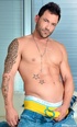 Handsome hunk shows off well-chiseled body and a thick hard cock, just